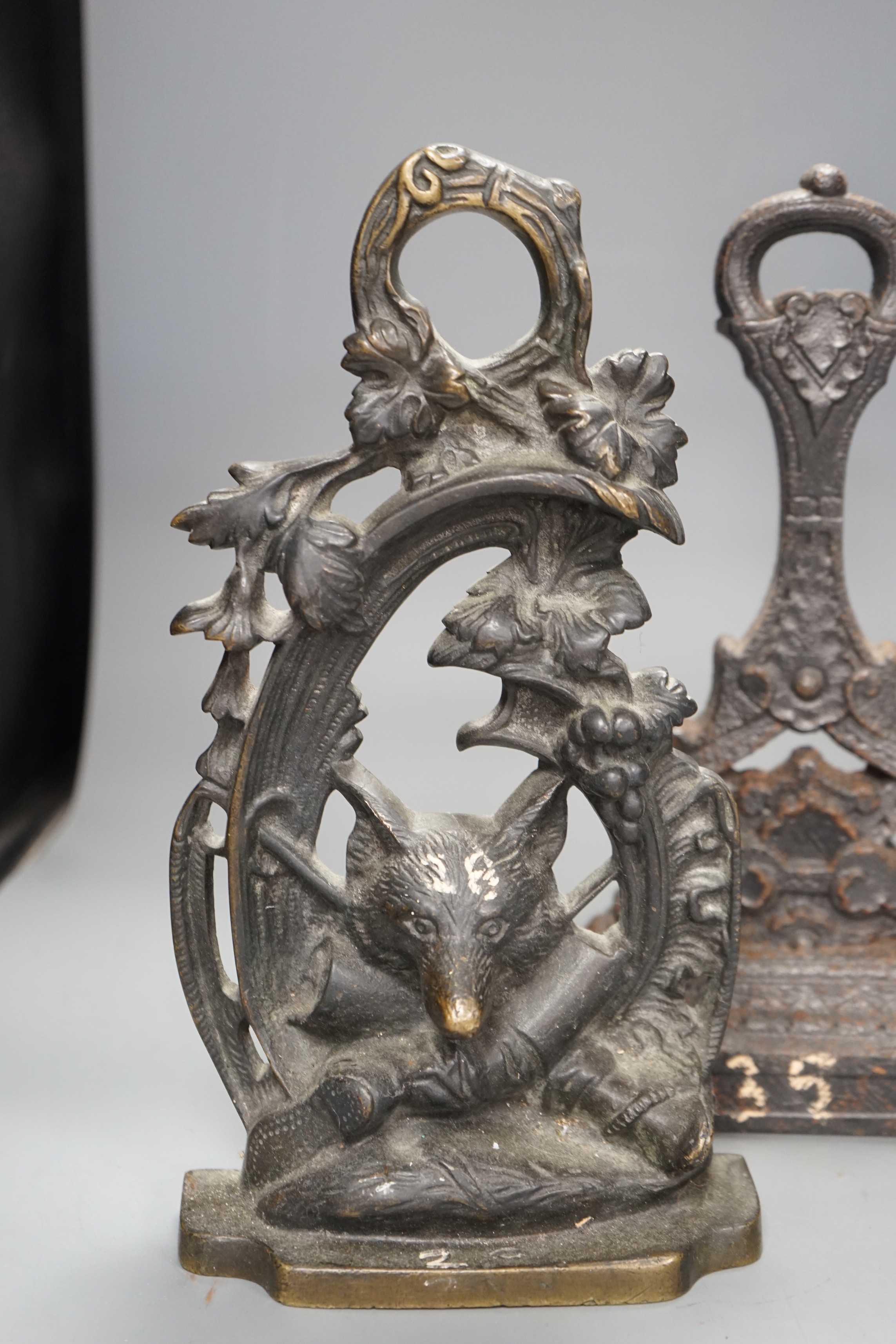 Four assorted Victorian cast iron doorstops, tallest 38cm